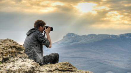 Sun cameras clouds men mountains wallpaper