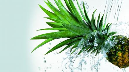 Pineapples splashes water white background wallpaper