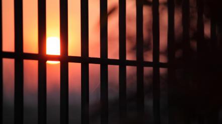 Sun fences silhouette sunlight blurred wallpaper