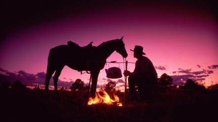 Silhouette cowboys wallpaper