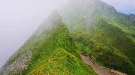 Mountains clouds landscapes grass fog switzerland wallpaper