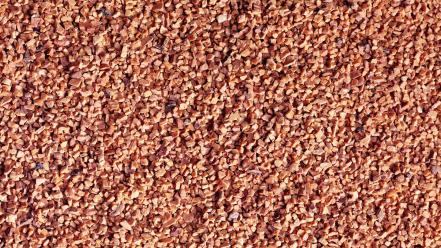 Close-up peanuts background chopped nuts wallpaper