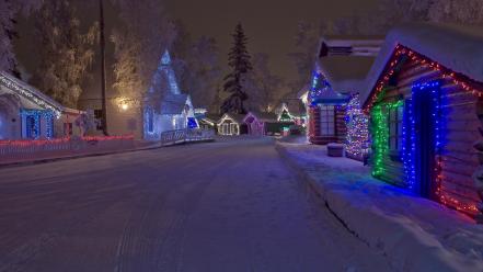 Snow trees streets houses christmas lights evergreens wallpaper