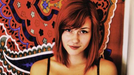 Redheads teen brown eyes carpet smiling shoulders wallpaper