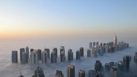 Buildings fog skies wallpaper