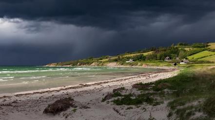 Beaches dark clouds grass hills houses wallpaper