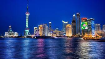 Cityscapes lights buildings reflections sea wallpaper