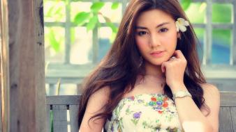 Brown chinese asians faces flower in girls wallpaper