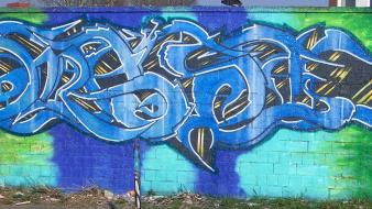 Graffiti spray street art wallpaper
