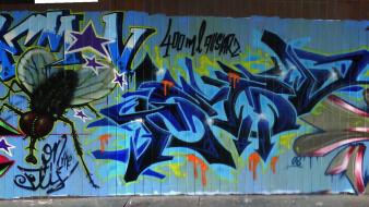 Graffiti spray street art wallpaper