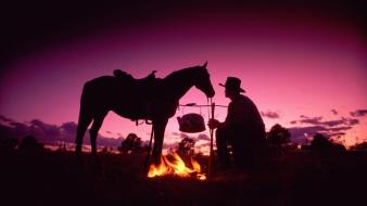 Silhouette cowboys wallpaper