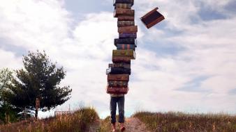 Jeans men outdoors suitcase stacked pathway blue skies wallpaper