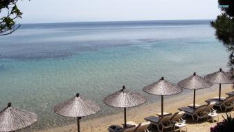 Nature beach sand umbrellas sea wallpaper