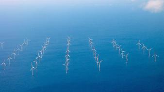 Ocean clouds windmills wind generators turbines sea wallpaper