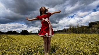 Women flowers fields wallpaper