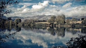 Clouds landscapes nature national geographic italy lakes reflections wallpaper
