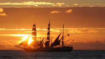 Sunset sunrise ocean ships sailing skyscapes sea wallpaper