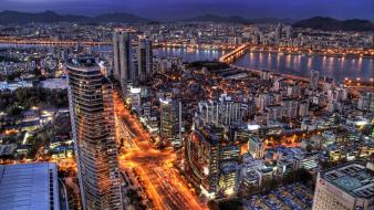 Cityscapes night buildings traffic lights skyscrapers roads wallpaper