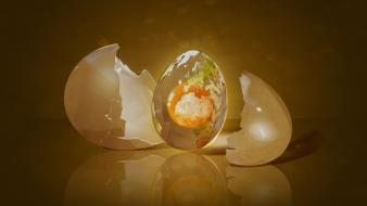 Abstract eggs dark planets earth continents yolks wallpaper
