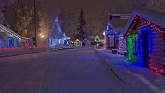 Snow trees streets houses christmas lights evergreens wallpaper