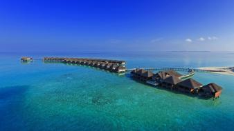 Holidays travel resort blue skies sea beach wallpaper