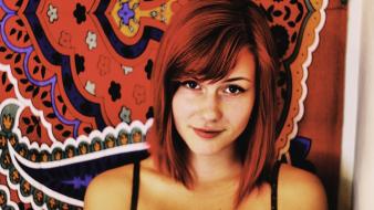 Redheads teen brown eyes carpet smiling shoulders wallpaper