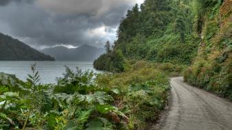 Chile carretera austral dark clouds green hills wallpaper