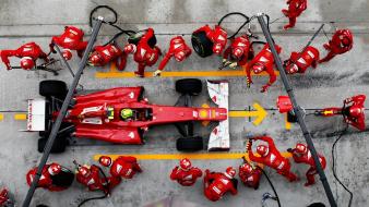 Ferrari formula one boxes cars mechanical wallpaper