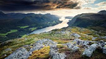 Norway dark clouds fjords grass hills wallpaper