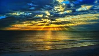 Cloudy beach sunset wallpaper