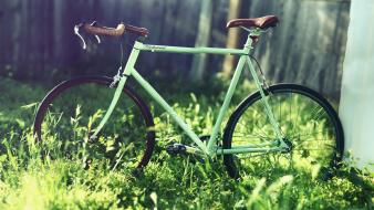 Bicycles blurred background grass wallpaper
