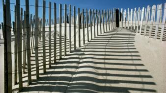 Nature beach fences shadows sunlight wallpaper