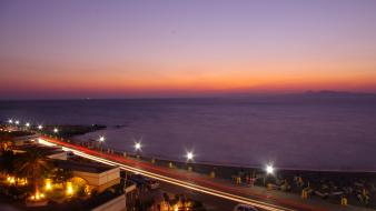 Night lights city seascapes skies rodos sea wallpaper